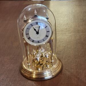 Vintage Linden Anniversary Mantel Clock Rotating Pendulum Glass Dome Germany